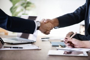professional handshake during a business meeting